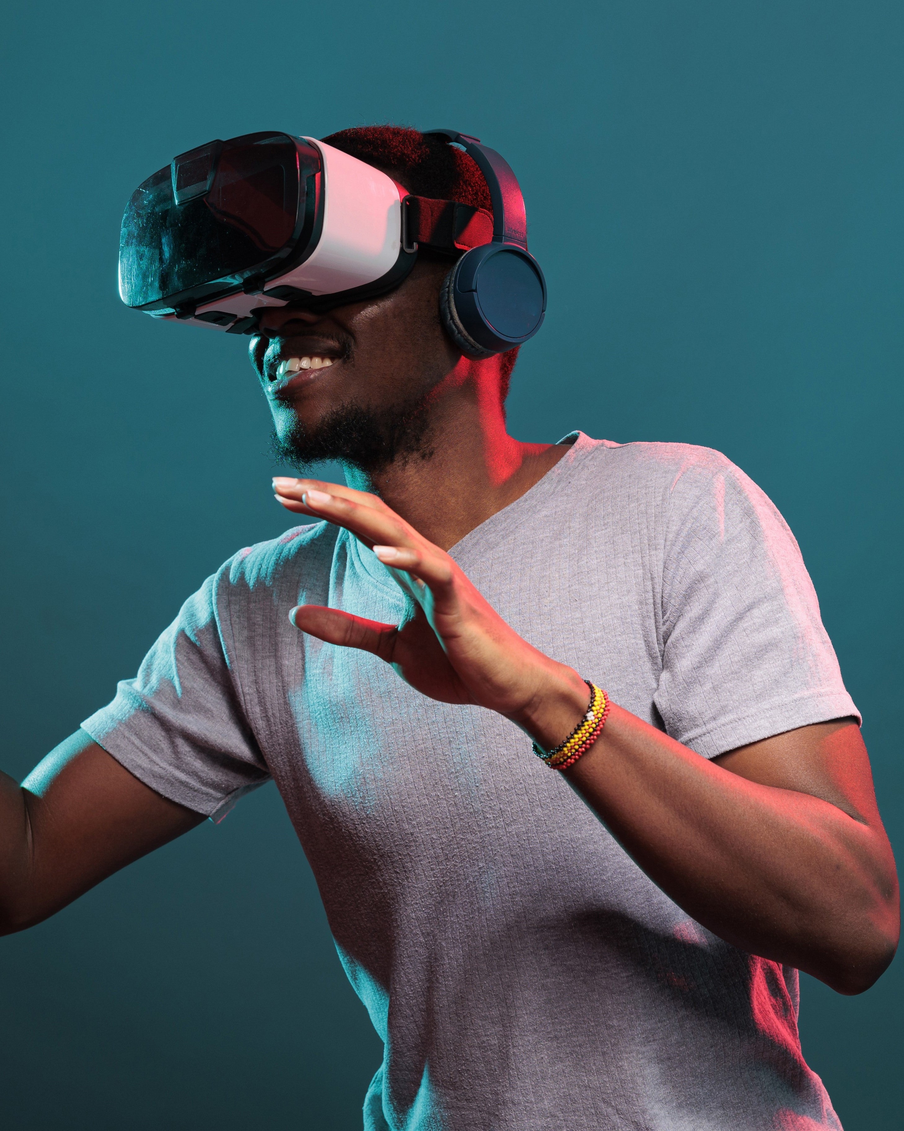 smiling-model-playing-virtual-game-interactive-vr-goggles-having-fun-with-modern-3d-technology-person-using-futuristic-device-with-visual-simulation-tech-innovation-leisure-activity_V.jpg